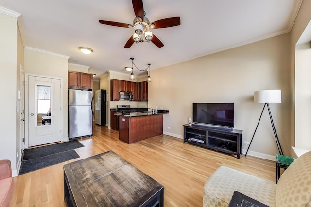 1949 N Whipple St Unit 1, Chicago, IL 60647 - living room with ornamental molding, ceiling fan, and light wood-style floors