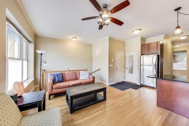 1949 N Whipple St Unit 1, Chicago, IL 60647 - living area featuring ceiling fan, crown molding, and light wood-type flooring