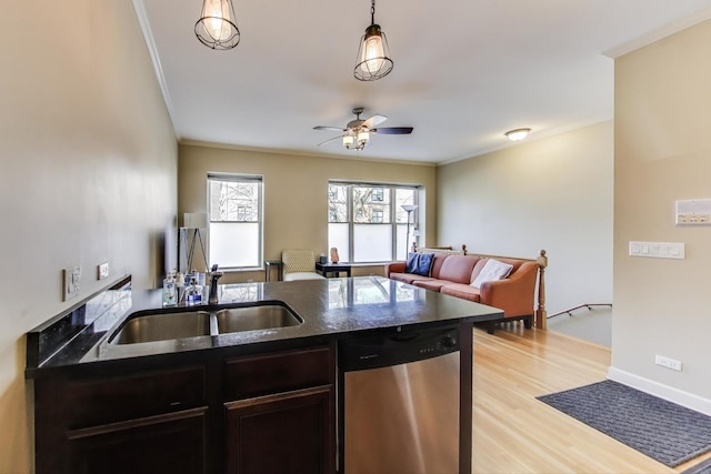 1949 N Whipple St Unit 1, Chicago, IL 60647 - kitchen with ornamental molding, stainless steel dishwasher, open floor plan, light wood-type flooring, and a peninsula
