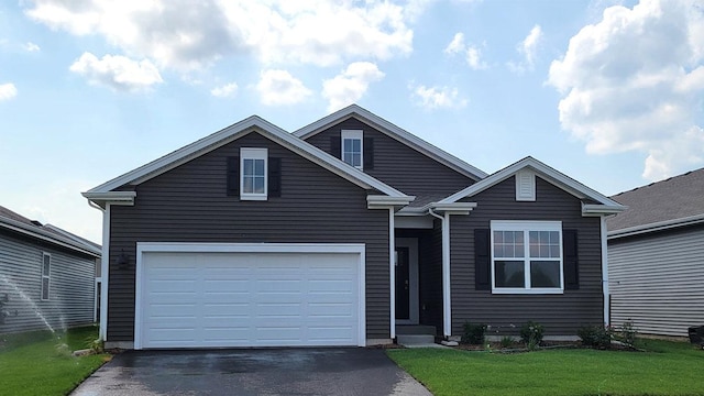 2296 Laurel Ct, Wonder Lake, IL 60097 - view of front of home featuring driveway and a front yard
