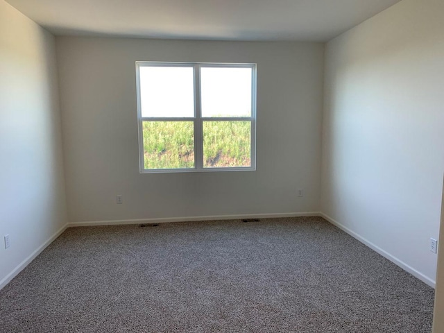 2296 Laurel Ct, Wonder Lake, IL 60097 - carpeted spare room with baseboards