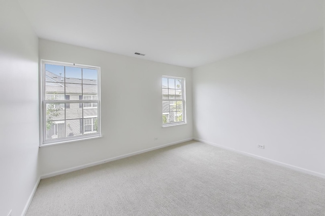 574 S Jade Ln, Round Lake, IL 60073 - unfurnished room with carpet flooring