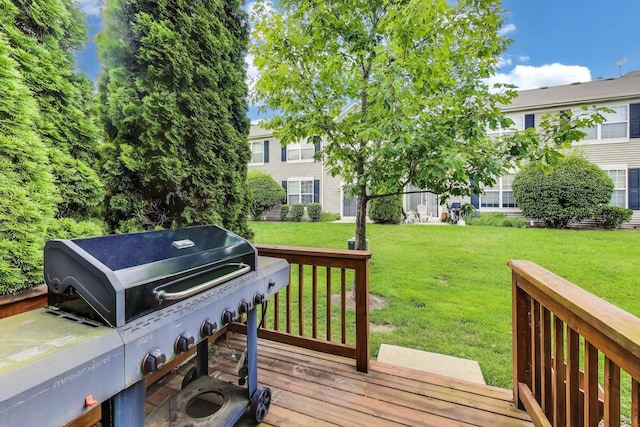 574 S Jade Ln, Round Lake, IL 60073 - wooden terrace featuring grilling area and a lawn