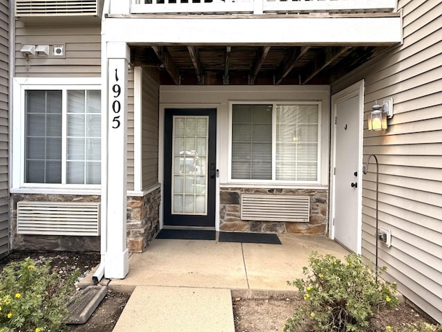 1905 Silverstone Dr Unit 1905, Carpentersville, IL 60110 - doorway to property featuring stone siding