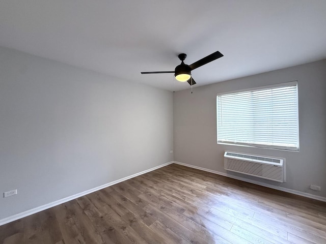 1905 Silverstone Dr Unit 1905, Carpentersville, IL 60110 - unfurnished room featuring wood finished floors, a ceiling fan, and a wall mounted air conditioner