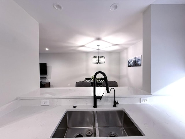 1905 Silverstone Dr Unit 1905, Carpentersville, IL 60110 - kitchen featuring light stone countertops and recessed lighting
