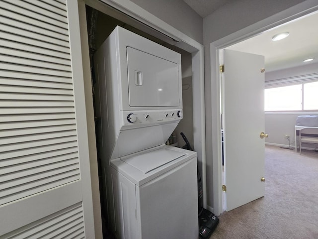 4400 Waubansie Ln, Lisle, IL 60532 - washroom with stacked washing machine and dryer and carpet flooring