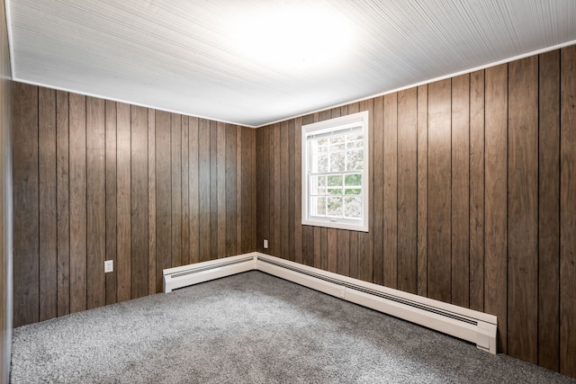 5113 W 79th Pl, Burbank, IL 60459 - carpeted empty room featuring baseboard heating and wood walls