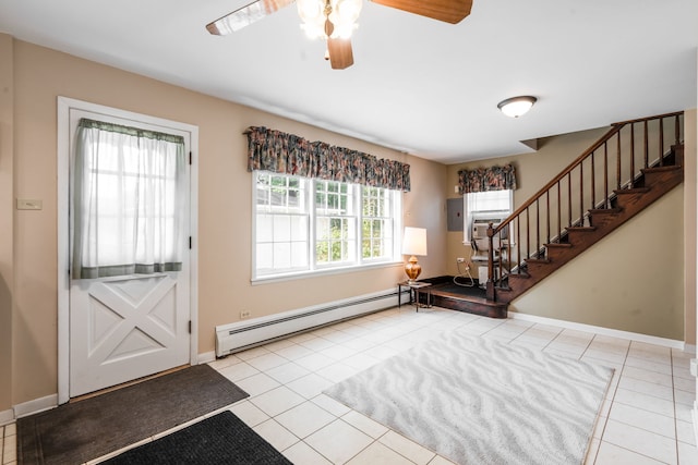 5113 W 79th Pl, Burbank, IL 60459 - tiled entryway featuring a baseboard heating unit, stairs, and a ceiling fan