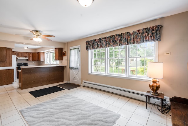 5113 W 79th Pl, Burbank, IL 60459 - kitchen with a baseboard heating unit, a peninsula, a ceiling fan, and light tile patterned floors
