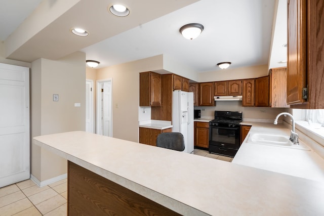 5113 W 79th Pl, Burbank, IL 60459 - kitchen with gas stove, white fridge with ice dispenser, light tile patterned flooring, light countertops, and a peninsula