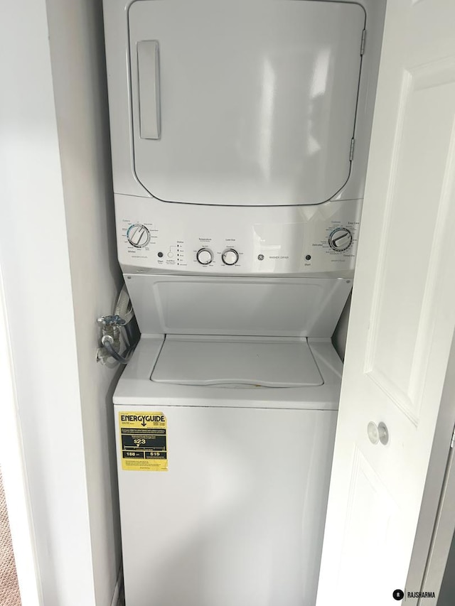 1212 Thyne Ct Unit 29C, Wheeling, IL 60090 - laundry area featuring stacked washer / drying machine