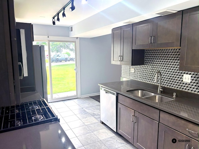 1212 Thyne Ct Unit 29C, Wheeling, IL 60090 - kitchen with decorative backsplash, stainless steel appliances, dark countertops, and dark brown cabinetry