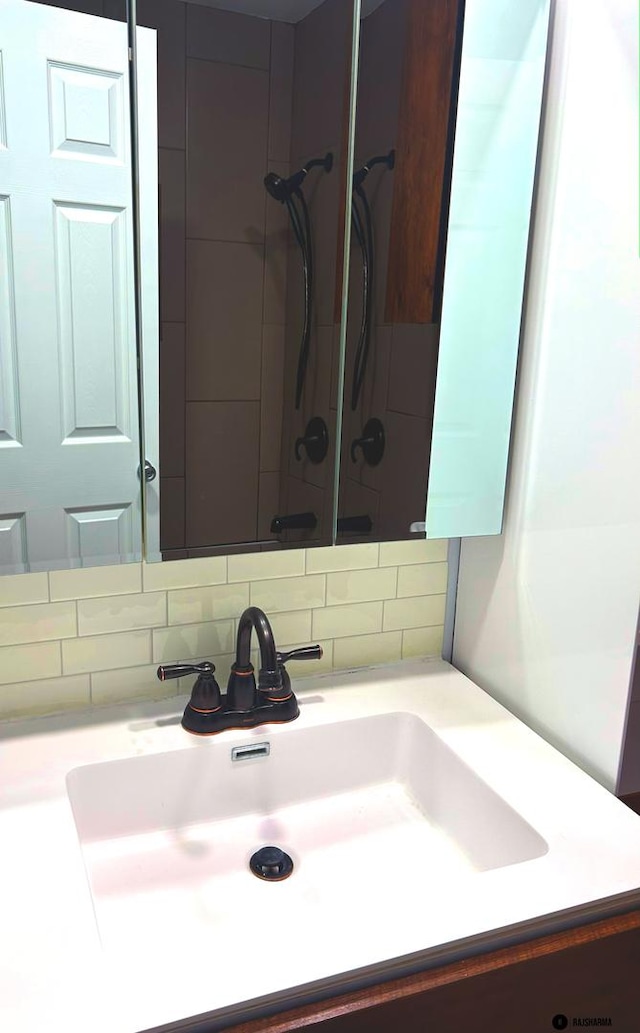 1212 Thyne Ct Unit 29C, Wheeling, IL 60090 - bathroom with vanity and decorative backsplash
