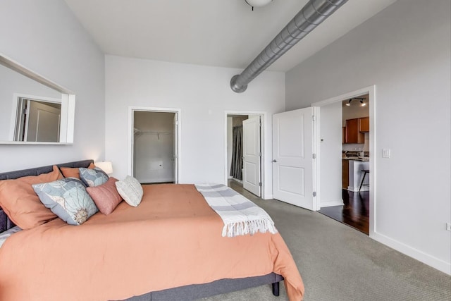 901 W Madison St Unit 609, Chicago, IL 60607 - carpeted bedroom with a walk in closet and baseboards