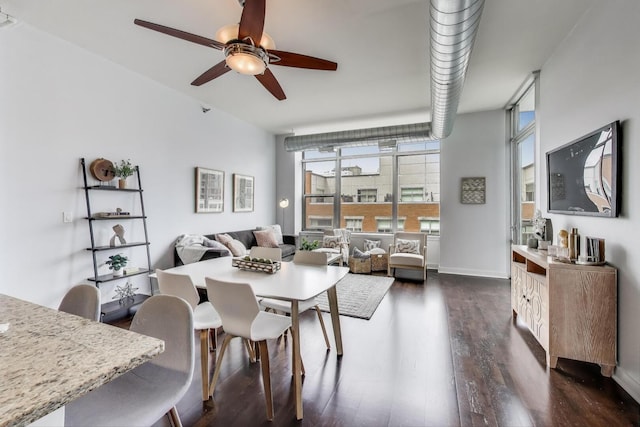 901 W Madison St Unit 609, Chicago, IL 60607 - dining space with dark wood-style floors and ceiling fan