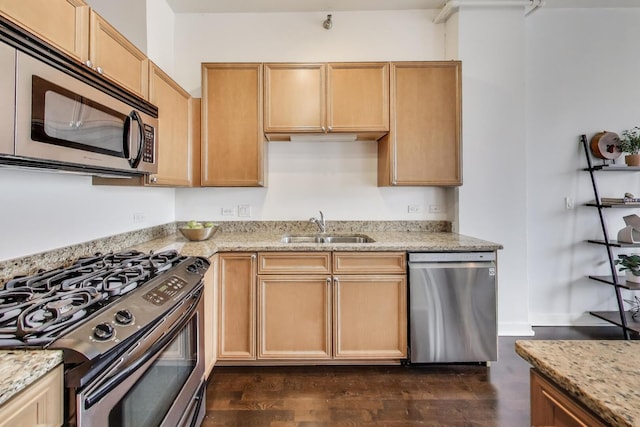 901 W Madison St Unit 609, Chicago, IL 60607 - kitchen with appliances with stainless steel finishes, light stone countertops, and dark wood-type flooring