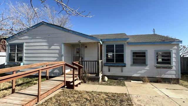 3105 Travis Ave, Midland, TX 79701 - view of front of property with a shingled roof