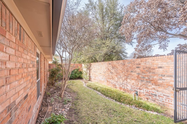 view of yard featuring a fenced backyard