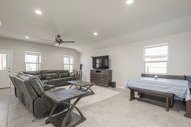 living area with ceiling fan, baseboards, vaulted ceiling, and recessed lighting