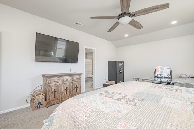 bedroom featuring light colored carpet, visible vents, vaulted ceiling, and baseboards