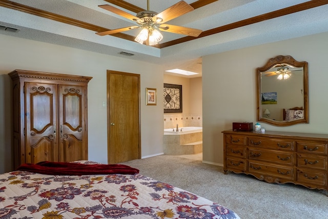 bedroom featuring carpet, a ceiling fan, connected bathroom, and visible vents