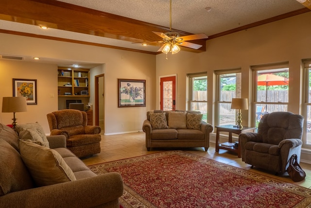 tiled living area with a textured ceiling, a ceiling fan, baseboards, visible vents, and ornamental molding