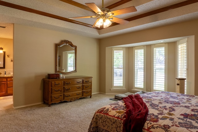bedroom with connected bathroom, baseboards, visible vents, and light carpet