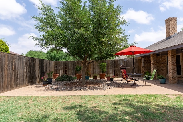 exterior space with a fenced backyard