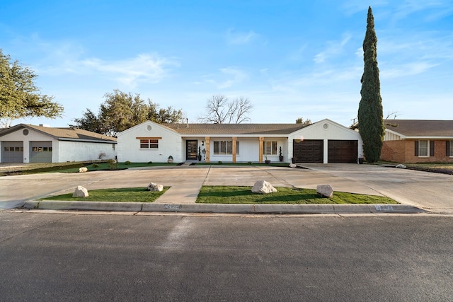 ranch-style home with a garage