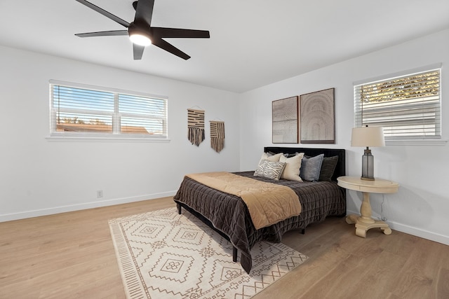 bedroom featuring ceiling fan and light wood-type flooring