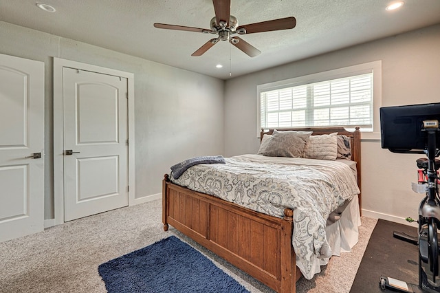 2804 W Dengar Ave, Midland, TX 79705 - bedroom featuring carpet flooring, recessed lighting, ceiling fan, baseboards, and a textured ceiling