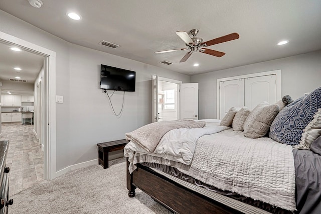 2804 W Dengar Ave, Midland, TX 79705 - bedroom with baseboards, recessed lighting, ceiling fan, a closet, and light carpet