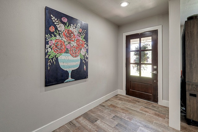 2804 W Dengar Ave, Midland, TX 79705 - entrance foyer with wood finished floors, baseboards, and recessed lighting