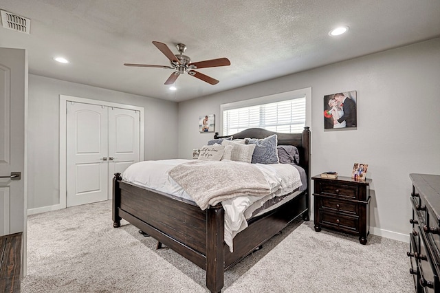 2804 W Dengar Ave, Midland, TX 79705 - bedroom featuring light carpet, baseboards, recessed lighting, a closet, and ceiling fan