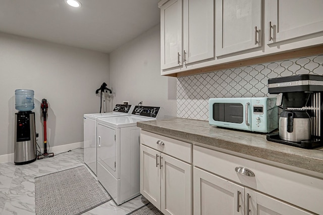 2804 W Dengar Ave, Midland, TX 79705 - laundry area featuring separate washer and dryer, light marble finish floors, cabinet space, recessed lighting, and baseboards
