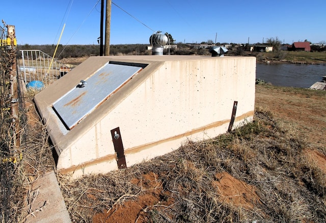 view of entry to storm shelter