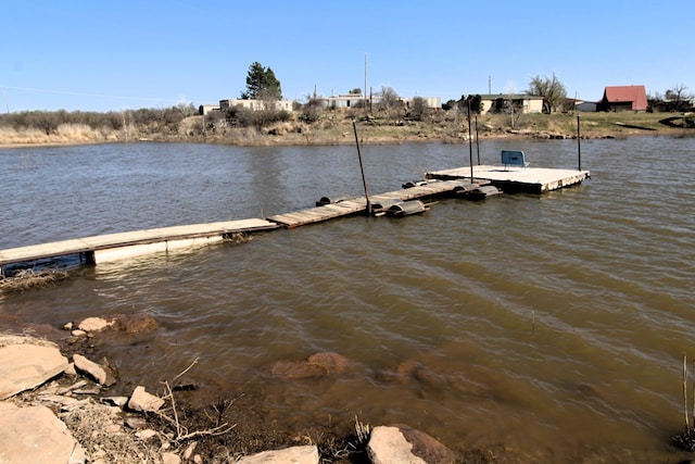 view of dock with a water view
