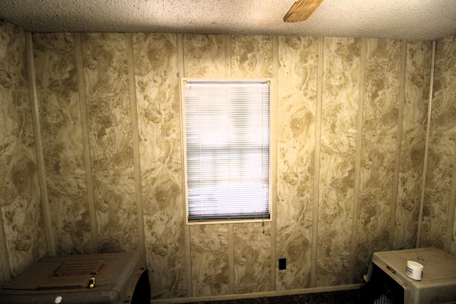 bathroom featuring a textured ceiling