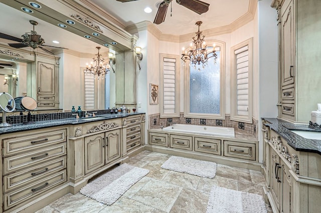 bathroom with vanity, ornamental molding, a relaxing tiled tub, and an inviting chandelier