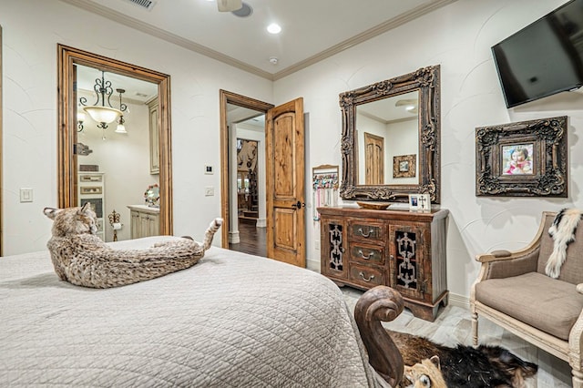 bedroom featuring wood-type flooring and ornamental molding