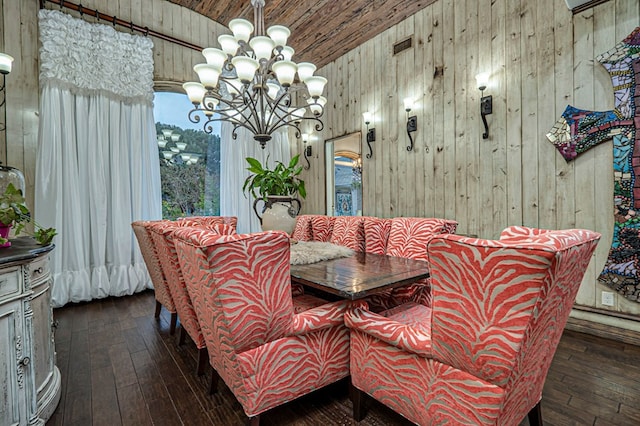 dining space featuring wooden ceiling, dark hardwood / wood-style floors, wooden walls, and a notable chandelier