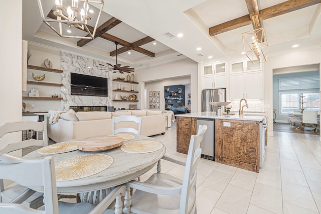 dining room featuring beam ceiling, coffered ceiling, a premium fireplace, and light tile patterned flooring