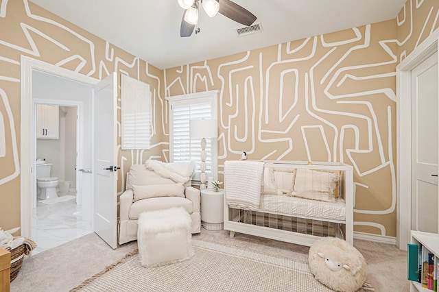 living area with ceiling fan, marble finish floor, and visible vents