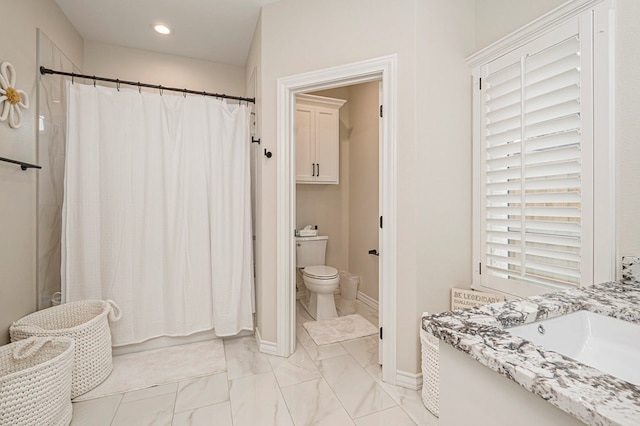 bathroom featuring toilet, recessed lighting, vanity, baseboards, and marble finish floor