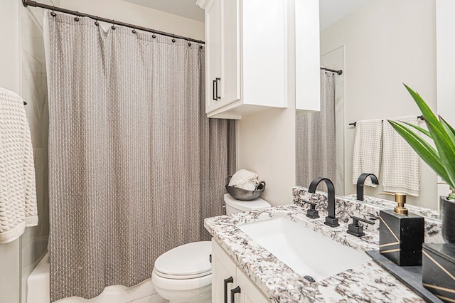 full bathroom with toilet, shower / tub combo, and vanity