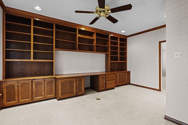 unfurnished office featuring built in study area, light colored carpet, recessed lighting, ceiling fan, and baseboards