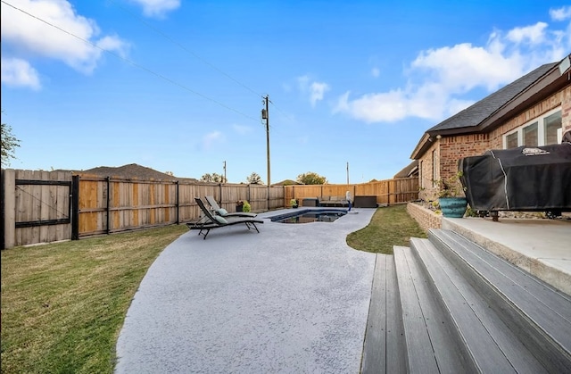 view of patio featuring grilling area