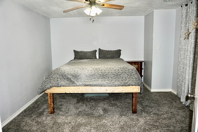 bedroom featuring carpet floors, a ceiling fan, baseboards, and a textured ceiling