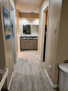 hallway featuring light hardwood / wood-style floors